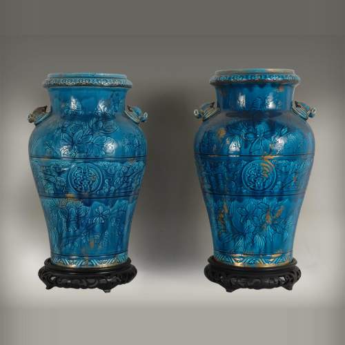 Longwy faience: pair of vases on a wood base