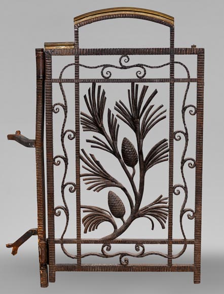 Wrought-iron fireplace spark guard with pine branch decoration, 1930s-1
