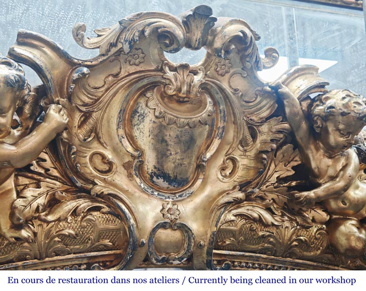 A richly gilded trumeau in the Napoleon III style, decorated with putti-2