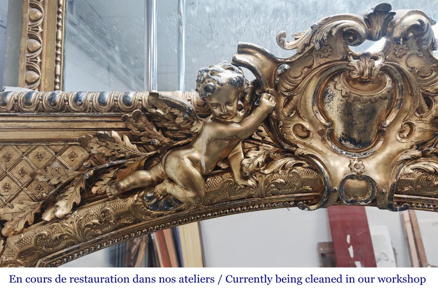 A richly gilded trumeau in the Napoleon III style, decorated with putti-3