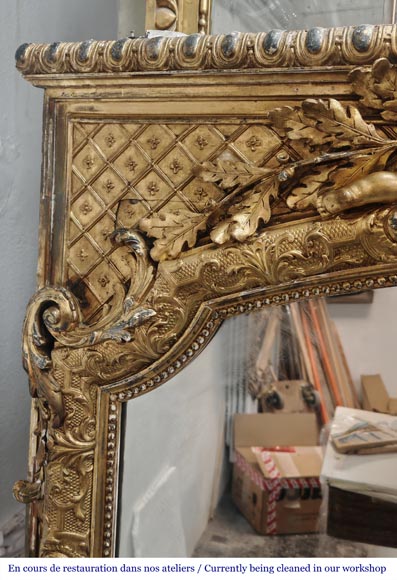 A richly gilded trumeau in the Napoleon III style, decorated with putti-4