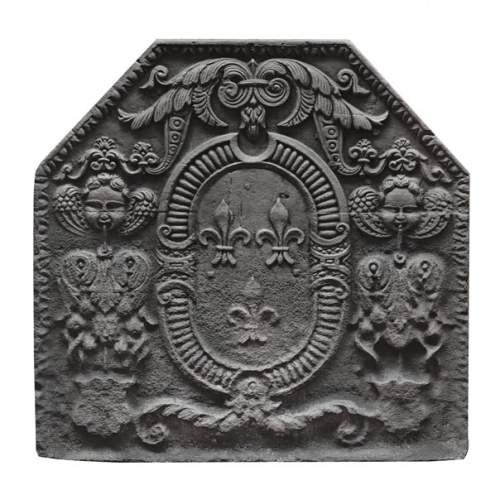 Cast iron fireplace plaque bearing the Arms of France, framed by cherubs