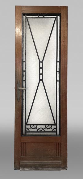 Art Deco interior door in wood and wrought metal, featuring geometric ornamentation and textured glass Art Deco interior door in wood and wrought metal, featuring geometric ornamentation and textured glass-0