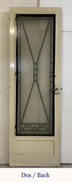 Art Deco interior door in wood and wrought metal, featuring geometric ornamentation and textured glass Art Deco interior door in wood and wrought metal, featuring geometric ornamentation and textured glass-1