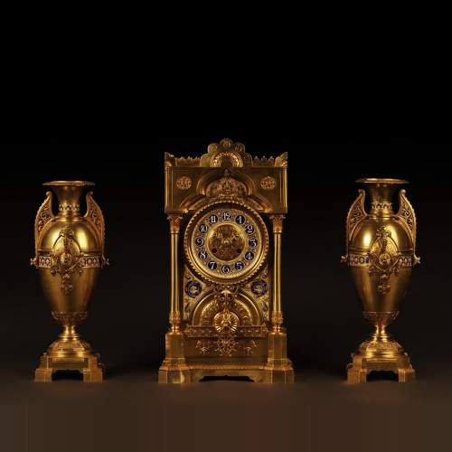 Mantle garniture in the orientalist taste  in gilt-bronze with  polychrome porcelain decoration