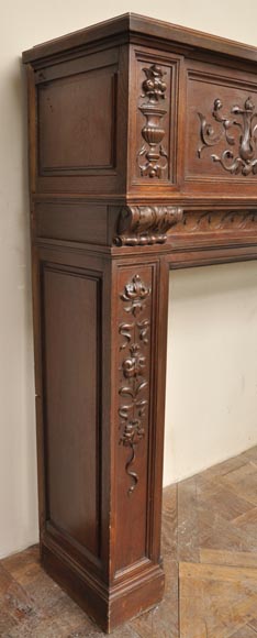 Antique Napoleon III style oak wood fireplace with 