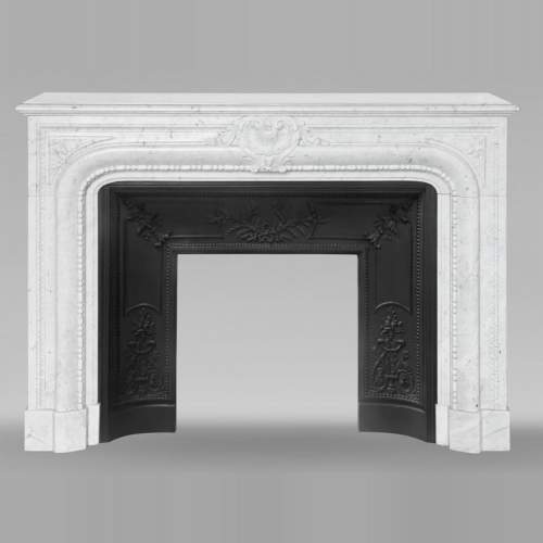 Louis XIV-style fireplace in Carrara marble, featuring a beaded molding