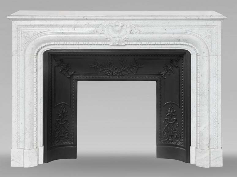 Louis XIV-style fireplace in Carrara marble, featuring a beaded molding Louis XIV-style fireplace in Carrara marble, featuring a beaded molding-0