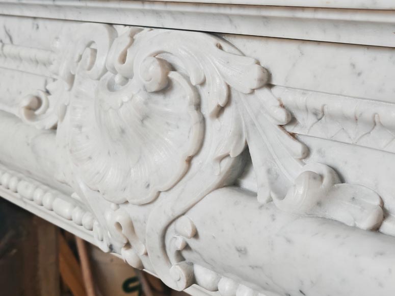 Louis XIV-style fireplace in Carrara marble, featuring a beaded molding Louis XIV-style fireplace in Carrara marble, featuring a beaded molding-3