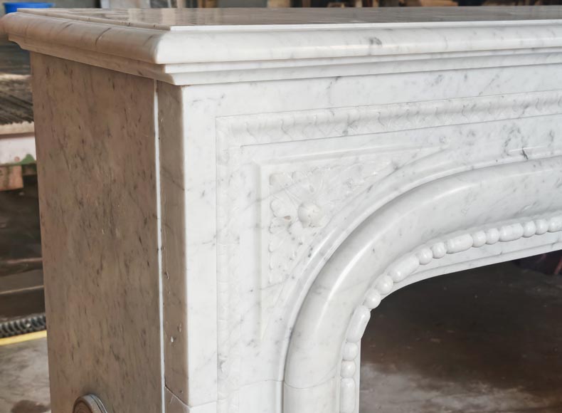 Louis XIV-style fireplace in Carrara marble, featuring a beaded molding Louis XIV-style fireplace in Carrara marble, featuring a beaded molding-5