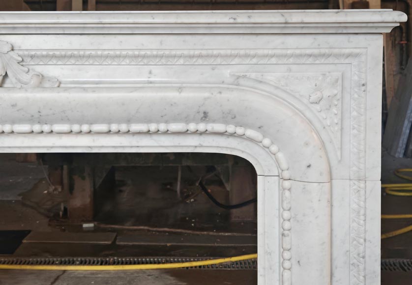 Louis XIV-style fireplace in Carrara marble, featuring a beaded molding Louis XIV-style fireplace in Carrara marble, featuring a beaded molding-9