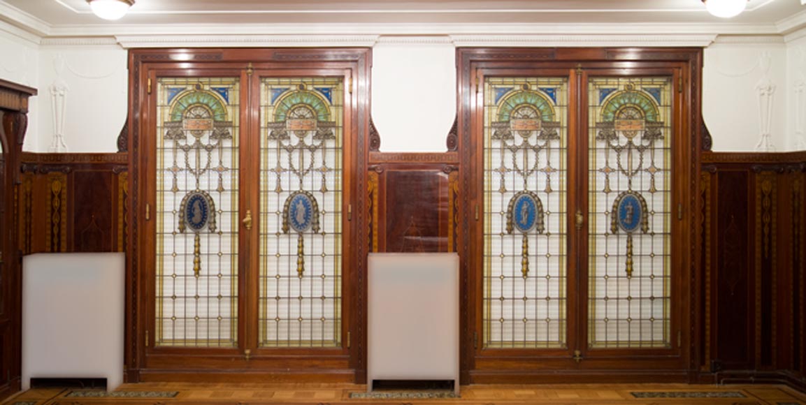 Exceptional antique Regency style complete paneled room in mahogany marquetry with fireplace, France 19th century-20