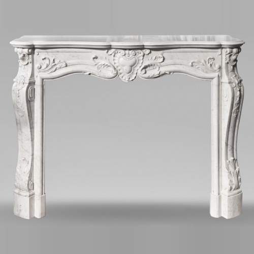 Richly decorated Louis XV style Carrara marble fireplace