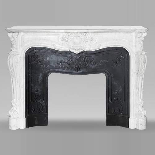 Highly sculpted Louis XV style fireplace in Carrara marble