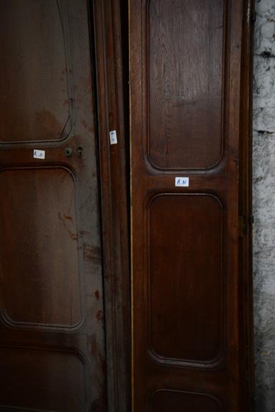 Antique large door in oak with paneled decoration, circa 1900-4