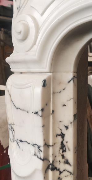 Louis XV style fireplace in Paonazzo marble decorated with a foliate shell-7
