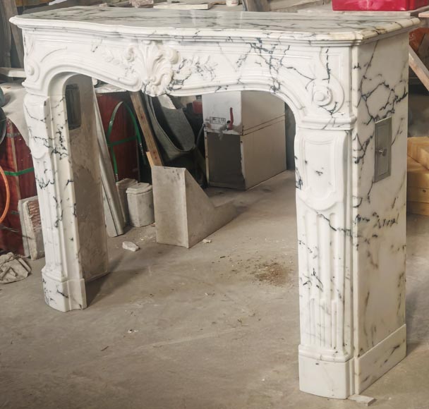 Louis XV style fireplace in Paonazzo marble decorated with a foliate shell-8