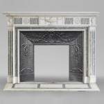 Beautiful Victorian style antique fireplace in Carrara Statuary marble and inlays of Vert d'Estours marble with vases and bowl