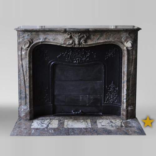 Antique Louis XV style fireplace in Red from the North marble with shell