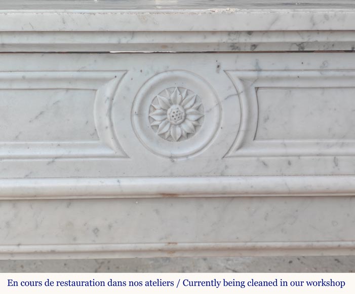 Louis XVI style Carrara marble mantel with rounded corners adorned with a sunflower flower-1