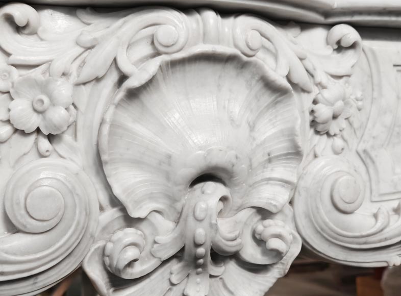 Louis XV style fireplace in Carrara marble, richly decorated with shells and flowers-2