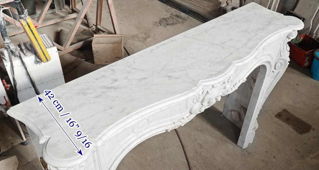 Louis XV style fireplace in Carrara marble, richly decorated with shells and flowers-13