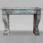 Antique Restoration style fireplace mantel in Bleu Fleuri marble