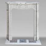 Small Louis XV style Pompadour mantel in Carrara marble