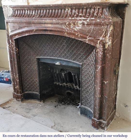 Louis XIV style mantel with an acroterion in Red of the North marble-5