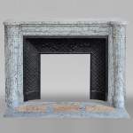 Beautiful Louis XVI style mantel with half columns in Bleu Fleuri marble