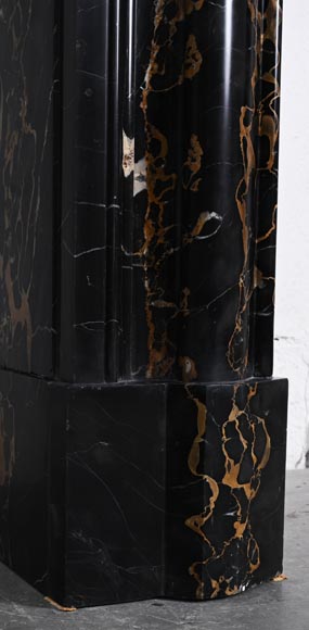 Louis XIV style fireplace in Portoro marble, with a molding and rounded frieze-4