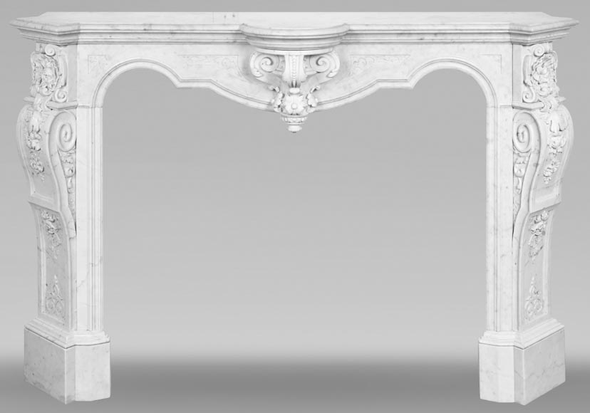A richly sculpted Carrara marble fireplace in the Napoleon III style, decorated with a lion's head.-0