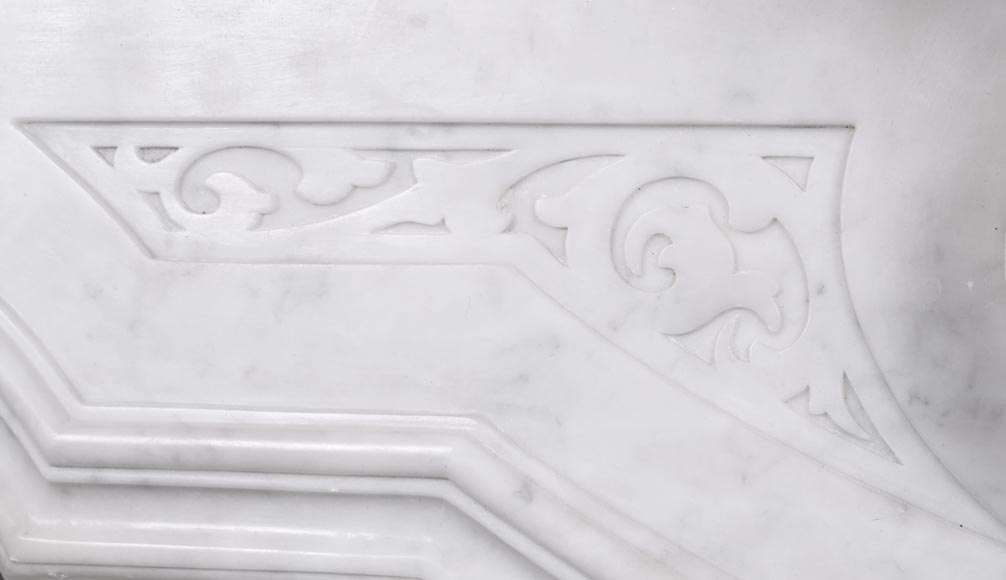 A richly sculpted Carrara marble fireplace in the Napoleon III style, decorated with a lion's head.-3