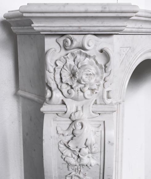 A richly sculpted Carrara marble fireplace in the Napoleon III style, decorated with a lion's head.-5