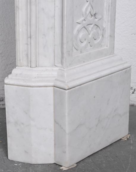 A richly sculpted Carrara marble fireplace in the Napoleon III style, decorated with a lion's head.-12
