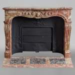 Louis XV style fireplace in Breche de Saint-Maximin marble