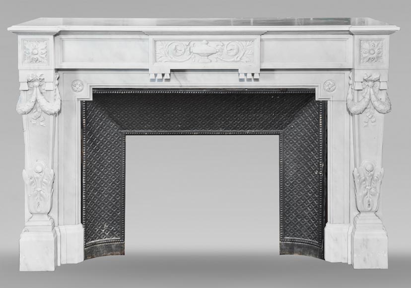 A Louis XVI style fireplace, richly decorated with garlands and vases, in Carrara marble-0