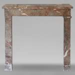 Louis XVI style mantel in Rouge du Nord marble