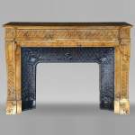 Louis XVI style mantel adorned with interlacing flowers in Sienna Brocatelle.