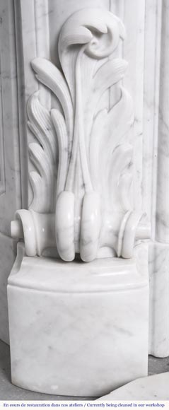 A highly sculpted Louis XV style fireplace in Carrara marble, decorated with a shell motif.-9