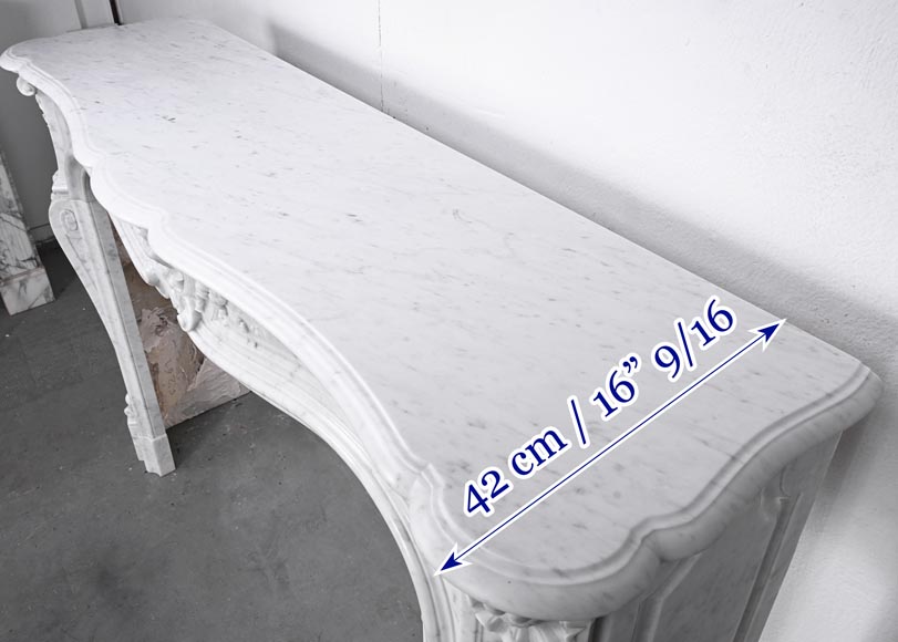Louis XV style fireplace in Carrara marble, decorated with a floral shell motif-13
