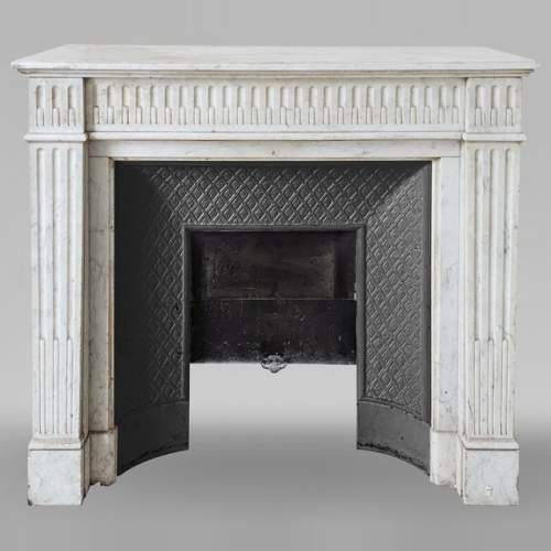 Louis XVI style mantel with Carrara marble jambs