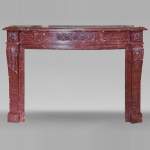 Louis XVI style mantel with rosette carved in red marble