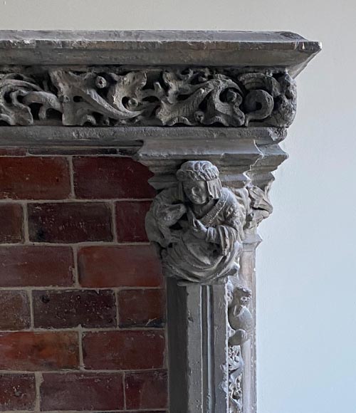 Gothic period stone mantelpiece with monsters and carved capitals-9