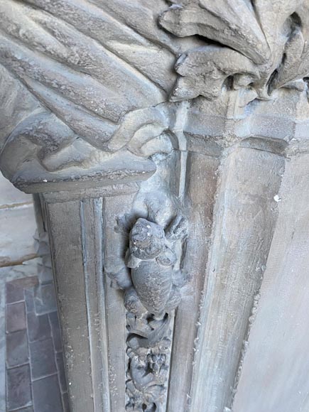 Gothic period stone mantelpiece with monsters and carved capitals-11