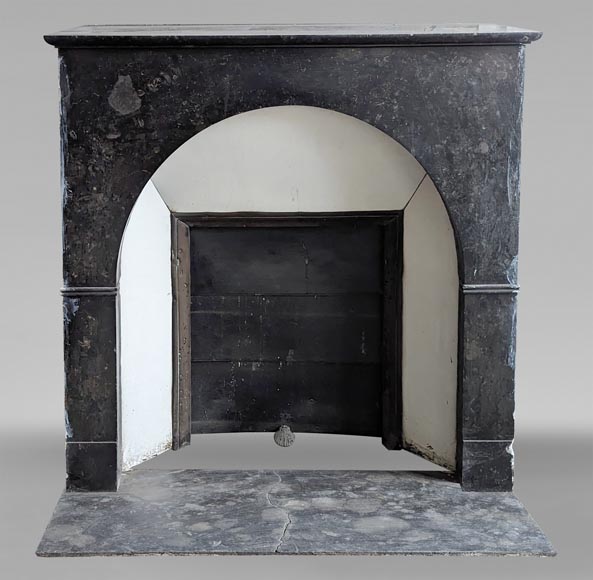 Restoration period arched mantel in black spotted marble-0