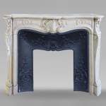 Louis XV style fireplace in Carrara marble decorated with a palmette