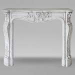 Louis XV style Carrara marble mantel decorated with foliate shells