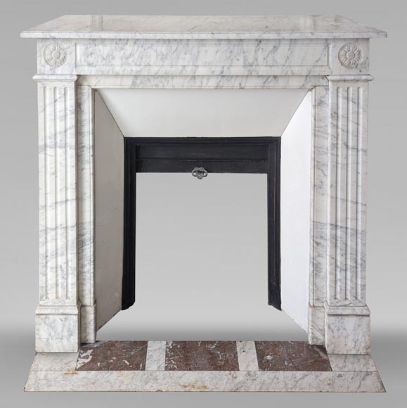 Louis XVI style mantel in veined Carrara marble with flower adorned heads-0