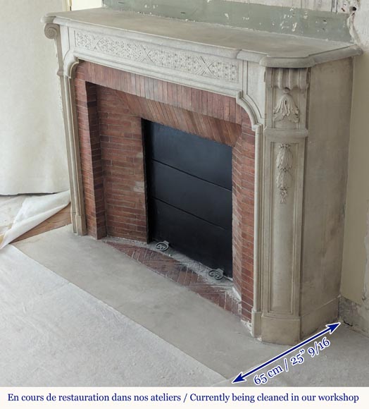 Napoleon III style stone mantel adorned with a holly frieze-6